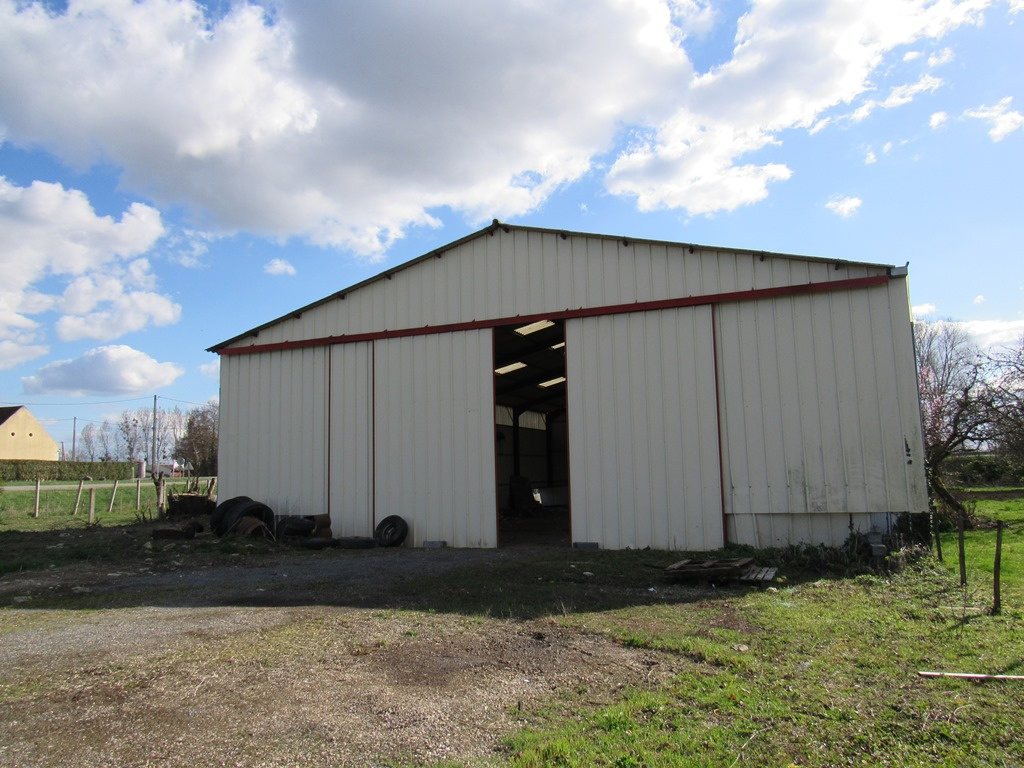 vente TERRAIN CONSTRUCTIBLE AVEC HANGAR DE 400M²
